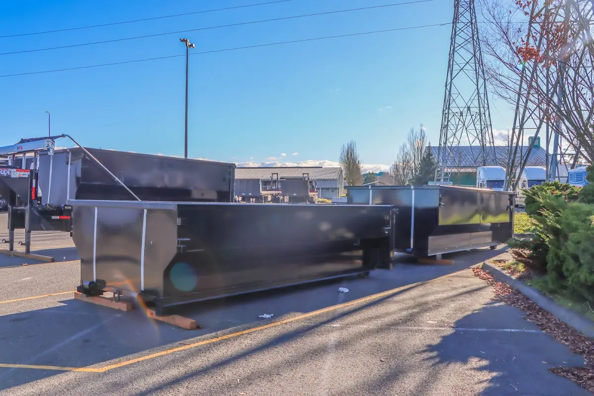 Roll-off dumpster ready for waste disposal at job site for Demolition Dumpster Rental in Maple Shade